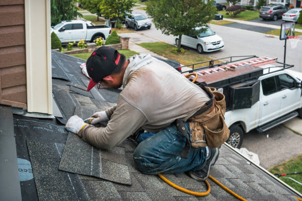 Professional Flat Roof Repair technician working in Montgomery, TX
